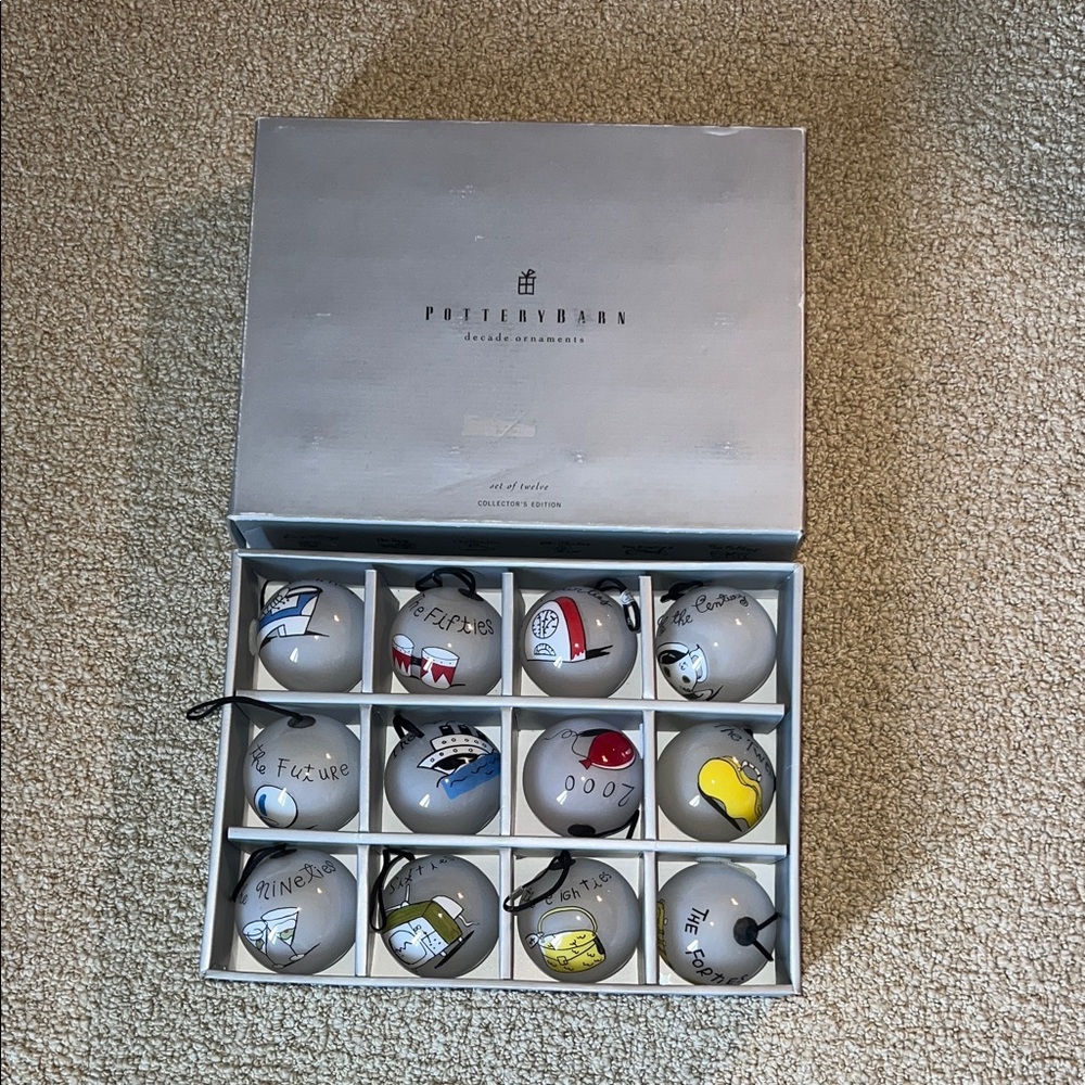 Pottery Barn glass decades ornaments. 12 ornaments